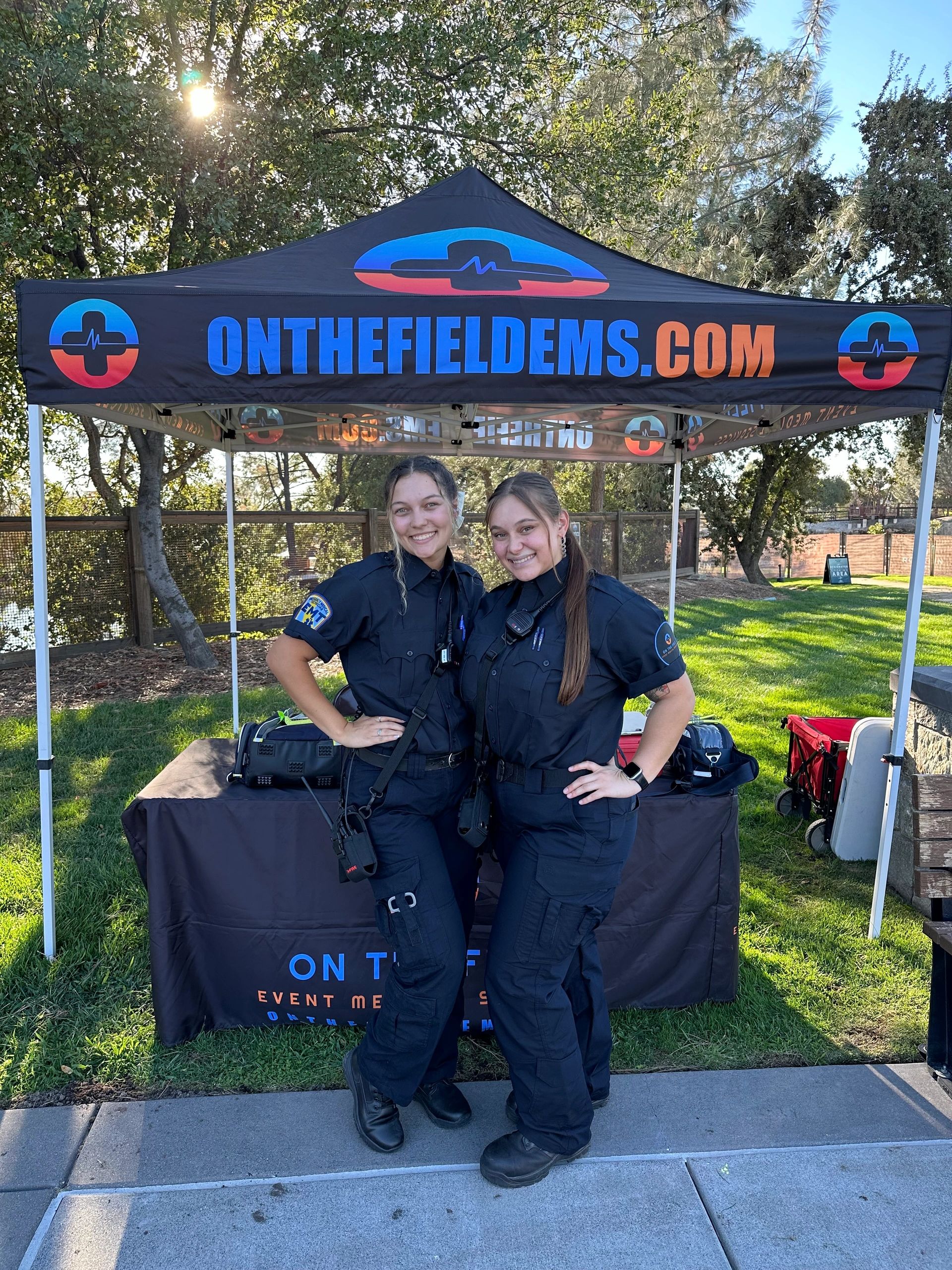 On the Field EMS team members at branded tent
